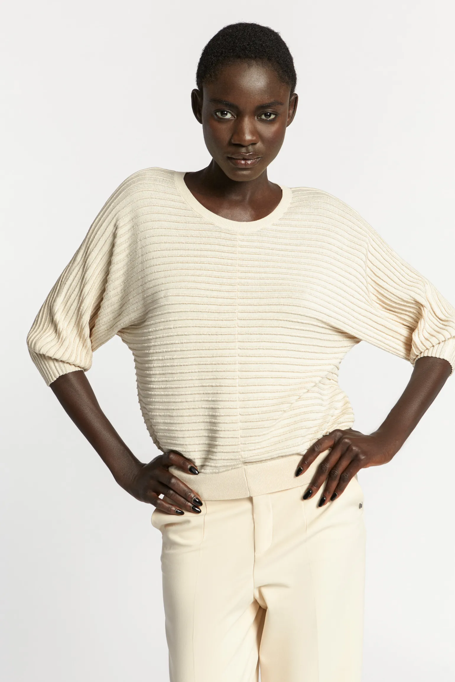 Pull met lurex en fantasiesteek