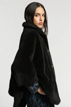 Zachte poncho in teddystof