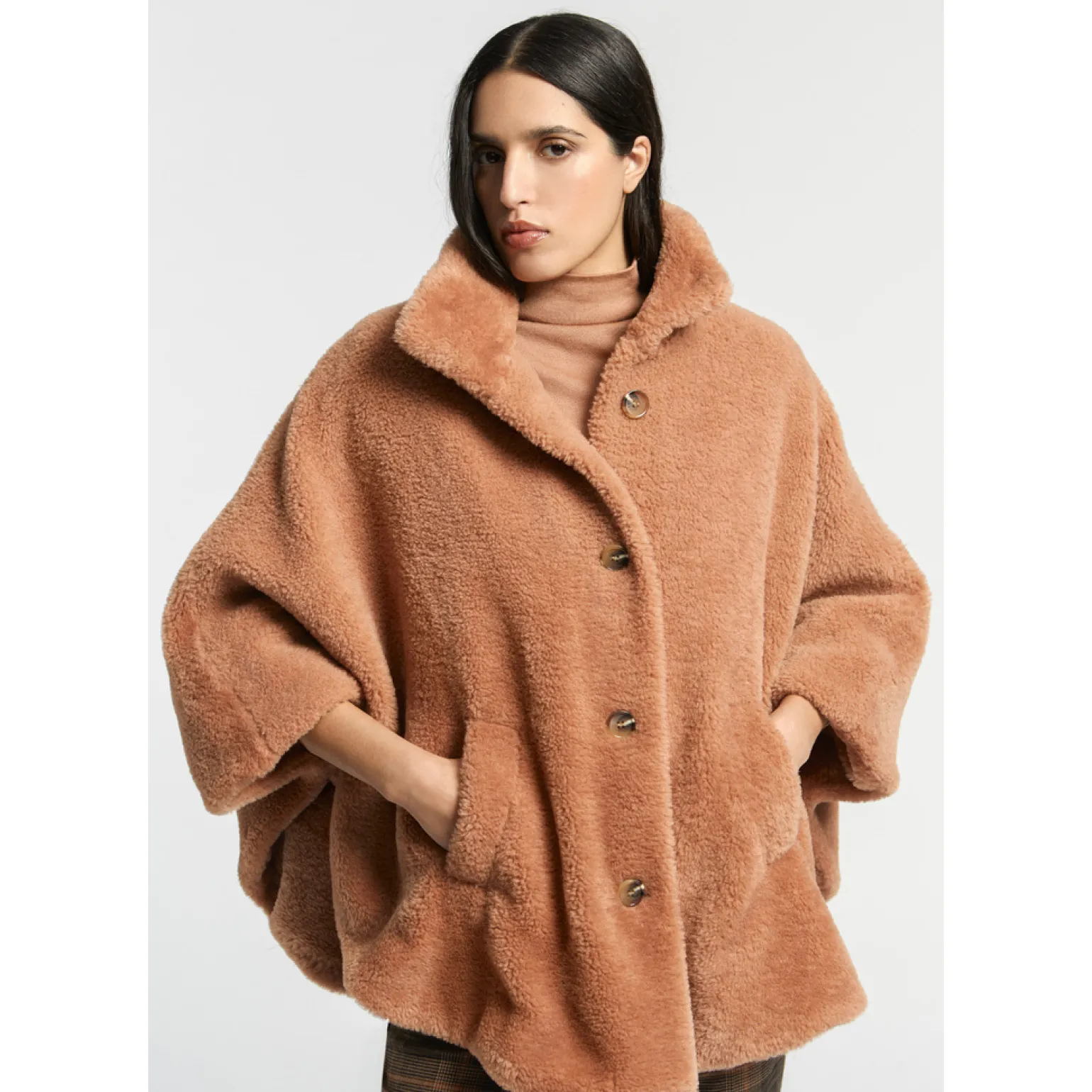 Zachte poncho in teddystof